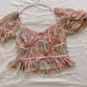 Isabelle’s cabinet puff sleeve top